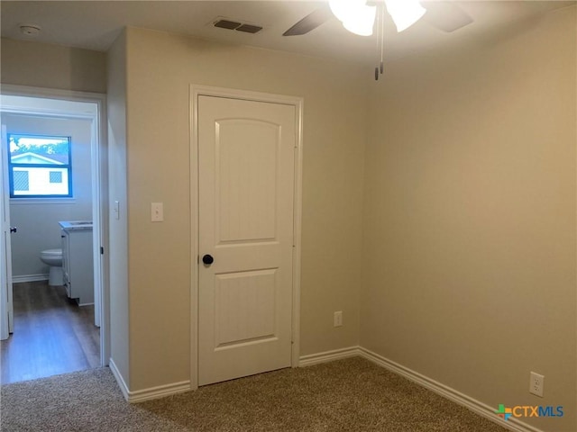 1502 Bowie Dr, Victoria, TX 77901 - carpeted spare room featuring a ceiling fan and a smoke detector