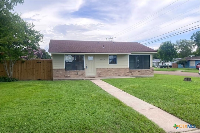 1502 Bowie Dr, Victoria, TX 77901 - single story home with brick siding and roof with shingles