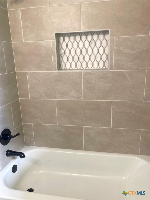 1502 Bowie Dr, Victoria, TX 77901 - full bath featuring bathing tub / shower combination