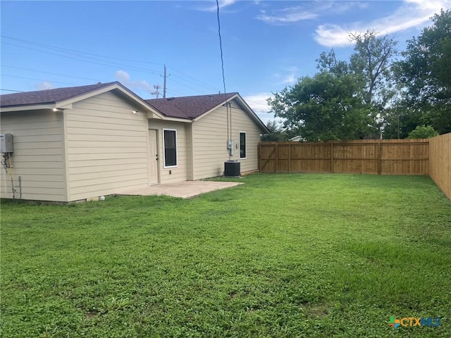 1502 Bowie Dr, Victoria, TX 77901 - rear view of property with a fenced backyard and roof with shingles