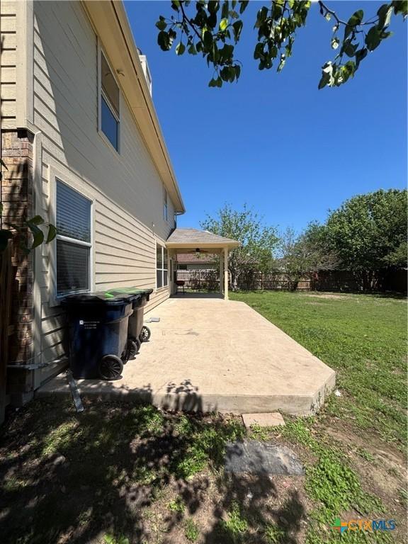 322 Lone Star Blvd, Hutto, TX 78634 - view of yard featuring a patio