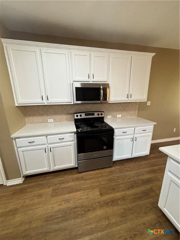 322 Lone Star Blvd, Hutto, TX 78634 - kitchen with appliances with stainless steel finishes, white cabinetry, and light countertops
