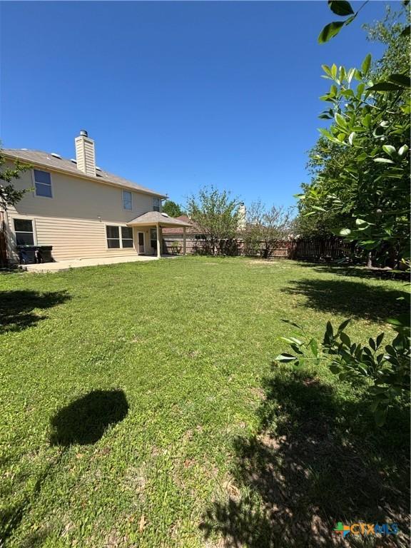 322 Lone Star Blvd, Hutto, TX 78634 - view of yard