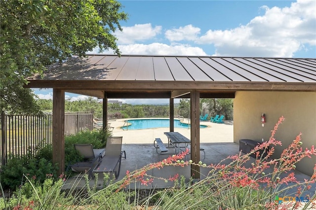 view of pool featuring a gazebo and a patio