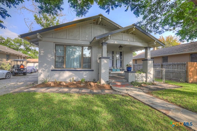 8 Herry Ct, New Braunfels, TX 78130 - view of front of home with brick siding, covered porch, and a ceiling fan