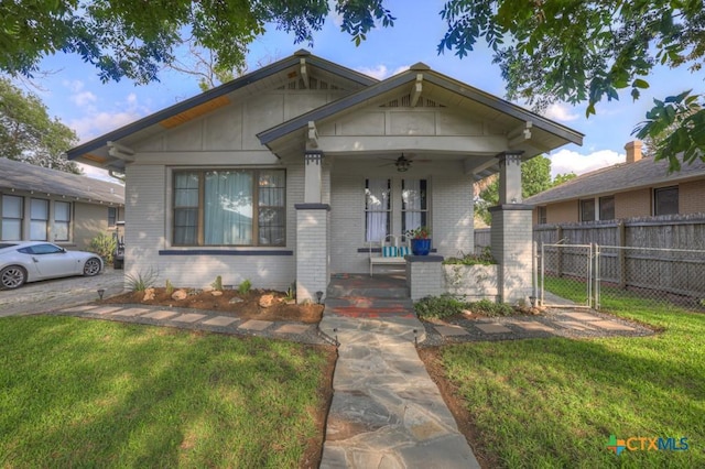 8 Herry Ct, New Braunfels, TX 78130 - bungalow with a porch, brick siding, and a ceiling fan