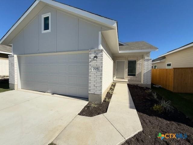 view of front of home with a garage