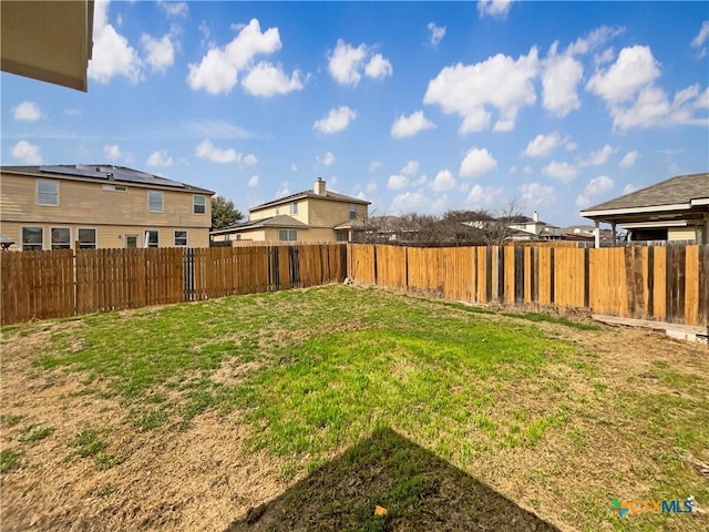 view of yard featuring a fenced backyard