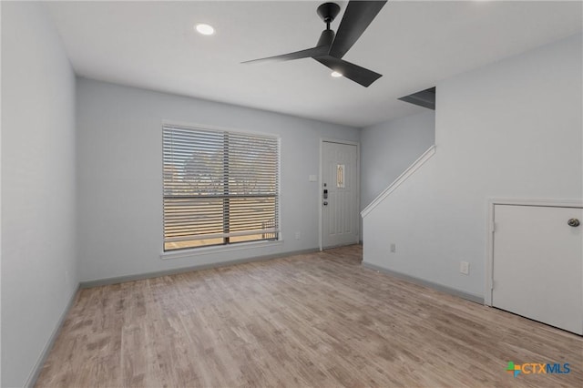 interior space featuring ceiling fan and light hardwood / wood-style flooring