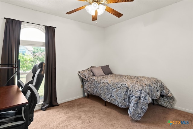 401 Suzie St, Killeen, TX 76542 - carpeted bedroom featuring baseboards and ceiling fan
