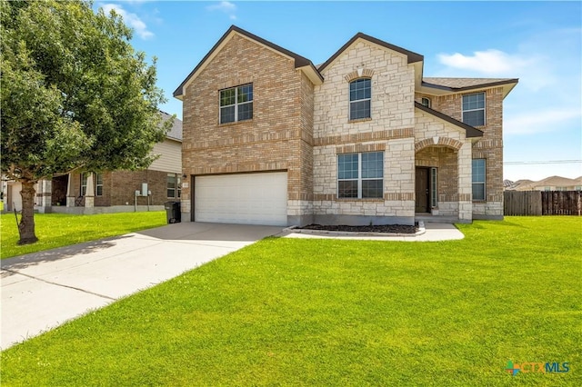2523 Red Fern Dr, Harker Heights, TX 76548 - french country home featuring stone siding, an attached garage, concrete driveway, and brick siding