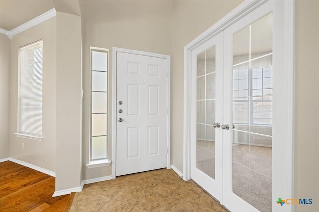 2523 Red Fern Dr, Harker Heights, TX 76548 - entryway with crown molding, french doors, and plenty of natural light