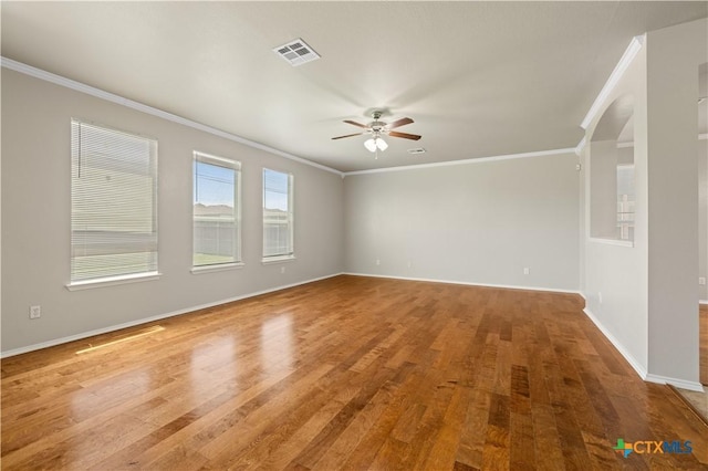 2523 Red Fern Dr, Harker Heights, TX 76548 - spare room with crown molding, a ceiling fan, and wood finished floors