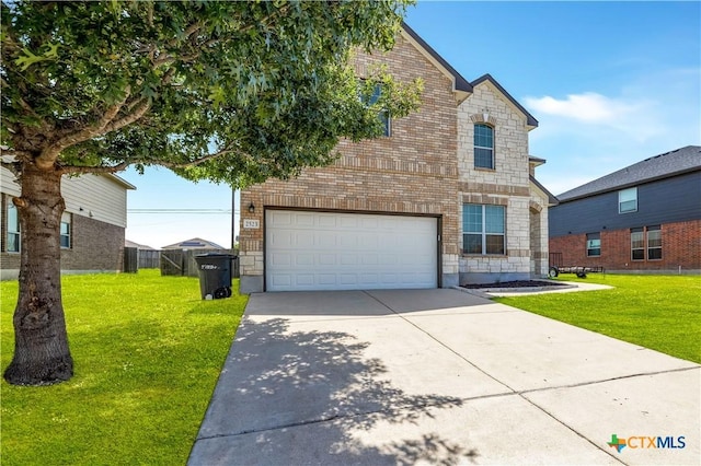 2523 Red Fern Dr, Harker Heights, TX 76548 - view of front facade featuring brick siding, concrete driveway, a garage, and a front yard