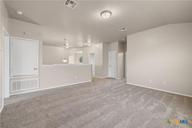 2523 Red Fern Dr, Harker Heights, TX 76548 - unfurnished living room featuring carpet flooring and lofted ceiling
