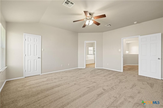 2523 Red Fern Dr, Harker Heights, TX 76548 - unfurnished bedroom featuring light colored carpet, connected bathroom, ceiling fan, and lofted ceiling
