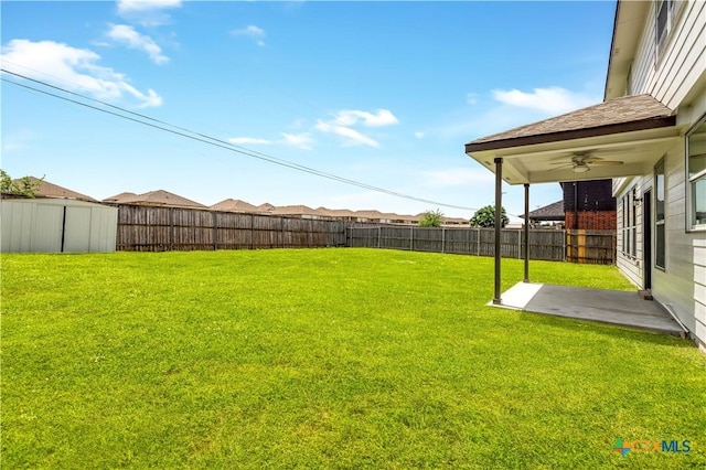 2523 Red Fern Dr, Harker Heights, TX 76548 - fenced backyard with ceiling fan and a patio
