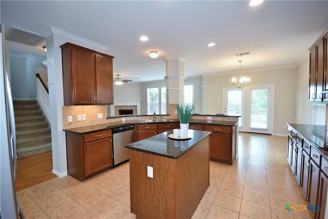 2009 Sandy Point Rd, Harker Heights, TX 76548 - kitchen with dishwasher, a peninsula, a center island, tasteful backsplash, and plenty of natural light