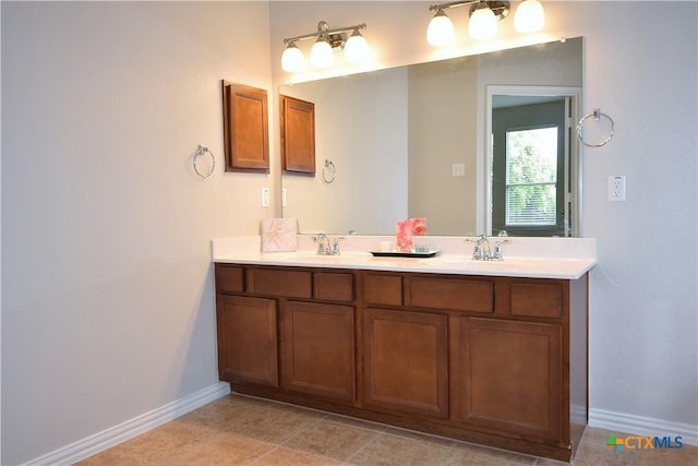 2009 Sandy Point Rd, Harker Heights, TX 76548 - full bathroom featuring double vanity and baseboards