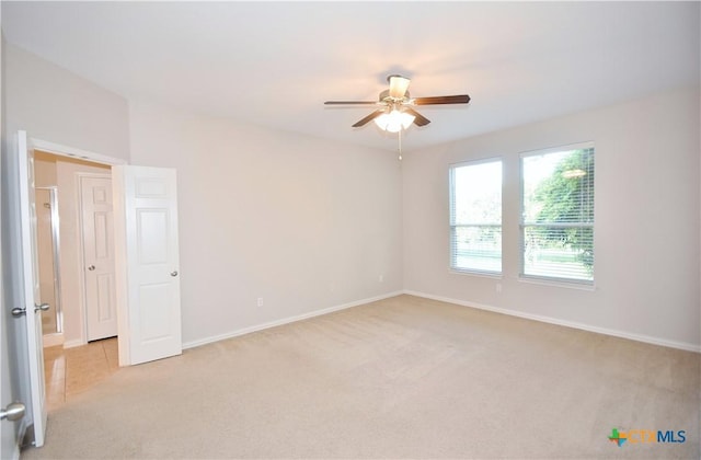 2009 Sandy Point Rd, Harker Heights, TX 76548 - spare room with light carpet and a ceiling fan