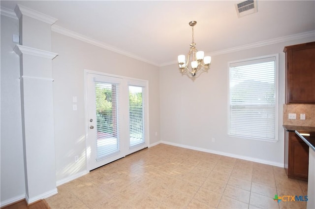 2009 Sandy Point Rd, Harker Heights, TX 76548 - unfurnished dining area with a chandelier, crown molding, and light tile patterned floors