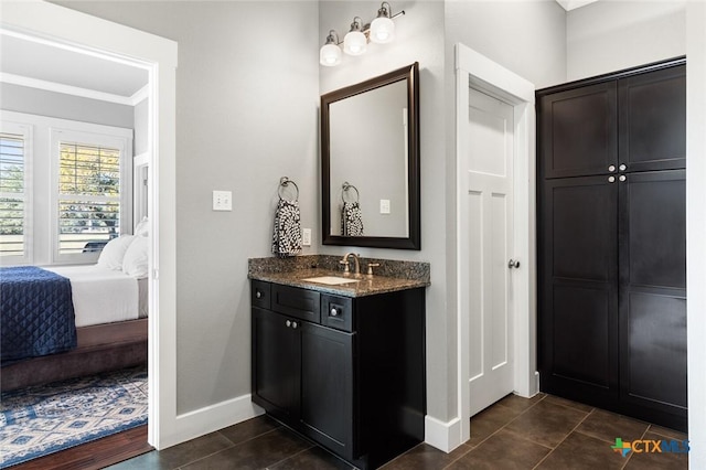 bathroom with vanity and tile patterned floors