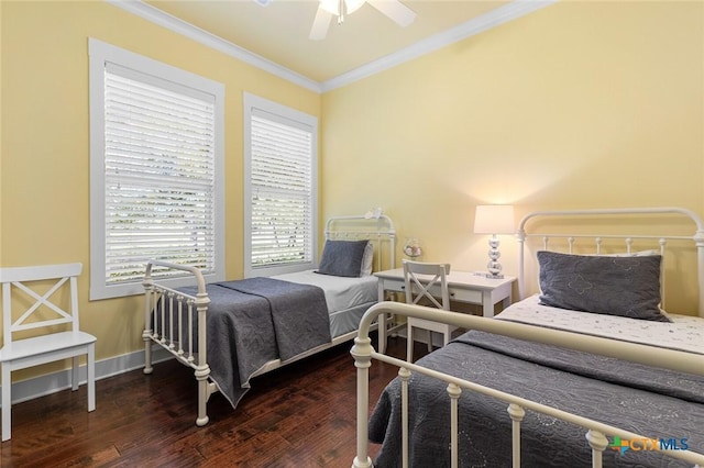 bedroom with ceiling fan, ornamental molding, and dark hardwood / wood-style flooring