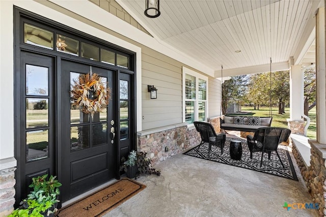 property entrance with a porch