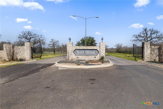 428 Colorado Dr, Cedar Creek, TX 78612 - community sign with a gate
