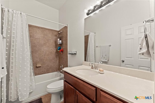 full bathroom with tile patterned flooring, vanity, shower / tub combo with curtain, and toilet