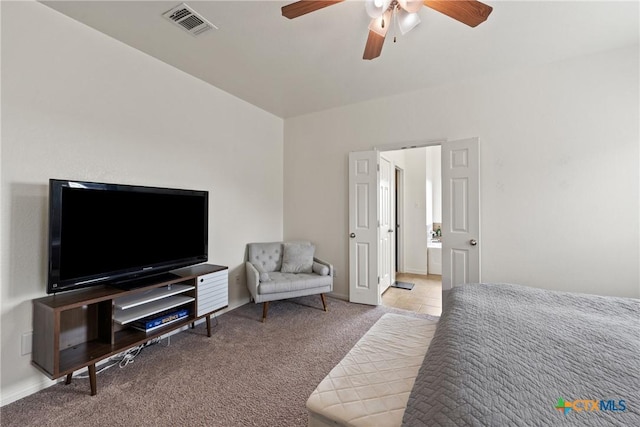 bedroom featuring ceiling fan and light colored carpet