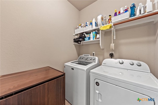 washroom featuring separate washer and dryer