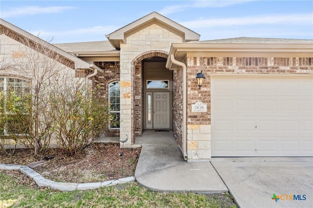 entrance to property with a garage