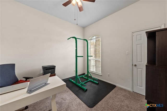 exercise room with ceiling fan and carpet