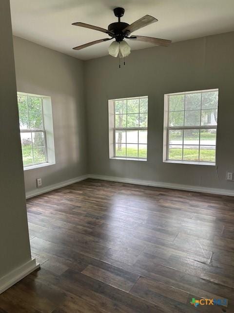 101 S Vine St, Victoria, TX 77901 - unfurnished room featuring ceiling fan and dark wood-style flooring