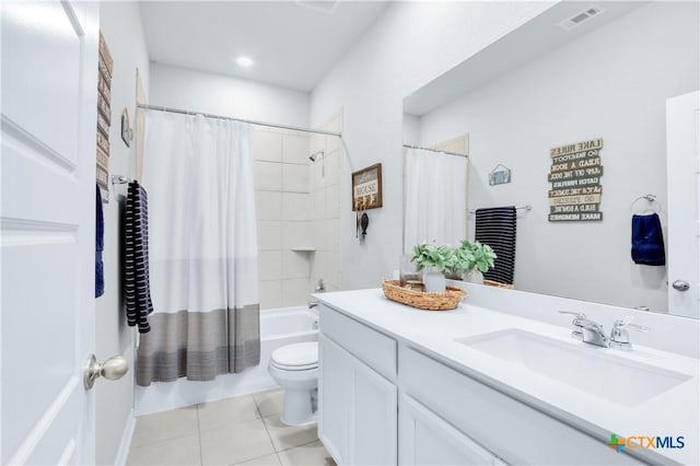 full bathroom with vanity, shower / bathtub combination with curtain, visible vents, tile patterned flooring, and toilet