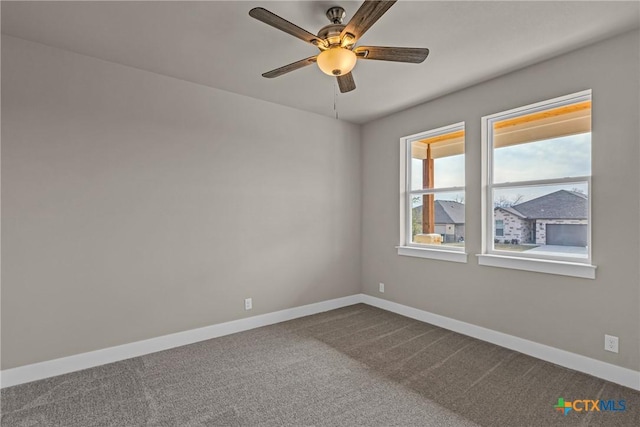 carpeted empty room with ceiling fan