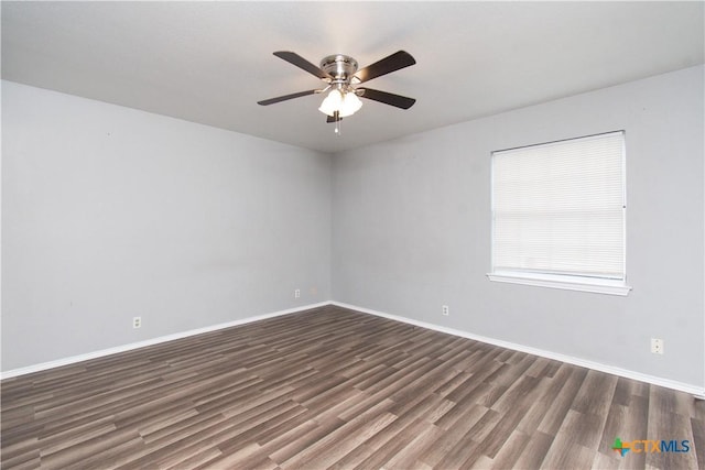 2709 San Jacinto Rd, Temple, TX 76502 - spare room featuring wood finished floors, a ceiling fan, and baseboards