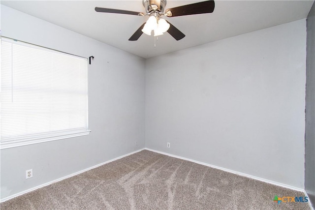 2709 San Jacinto Rd, Temple, TX 76502 - carpeted spare room featuring baseboards and a ceiling fan