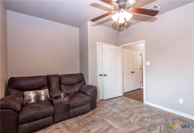 living room featuring ceiling fan