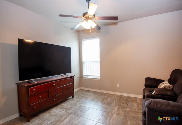 living room with ceiling fan