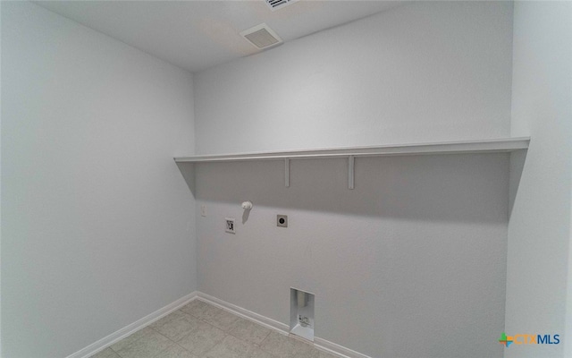 clothes washing area with washer hookup, hookup for a gas dryer, and hookup for an electric dryer