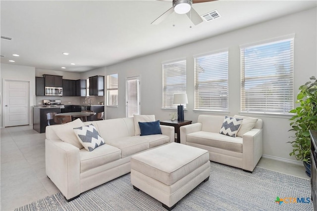 109 Cypress Hills Rd, San Marcos, TX 78666 - living area with plenty of natural light, a ceiling fan, and recessed lighting