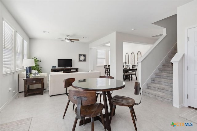 109 Cypress Hills Rd, San Marcos, TX 78666 - dining area with stairs, a ceiling fan, and light tile patterned floors