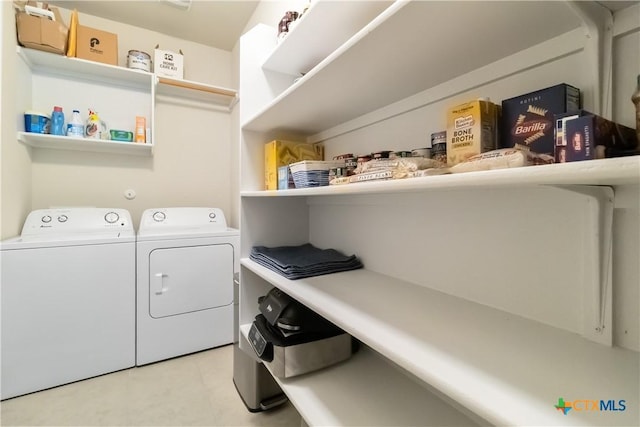 109 Cypress Hills Rd, San Marcos, TX 78666 - laundry area featuring washer and dryer and light tile patterned floors