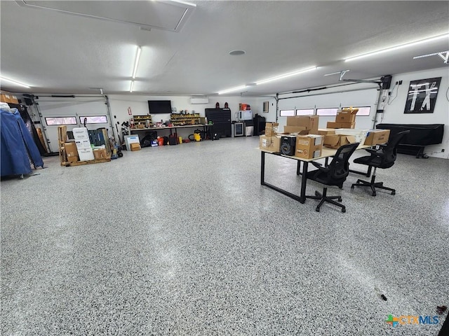 102 County Road 180, Leander, TX 78641 - garage featuring a wall mounted AC