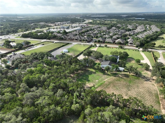 102 County Road 180, Leander, TX 78641 - aerial view of property and surrounding area with nearby suburban area
