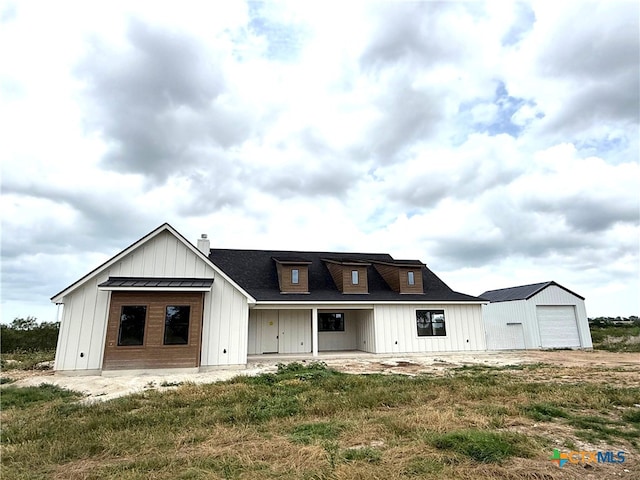 6340 Water Supply Rd, Temple, TX 76502 - modern farmhouse featuring a chimney, board and batten siding, and roof with shingles
