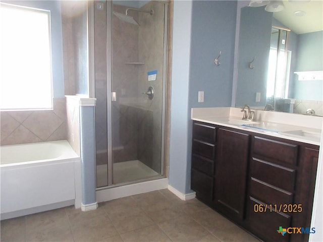 1418 Fawn Lily Dr, Temple, TX 76502 - bathroom featuring healthy amount of natural light, a stall shower, a garden tub, and tile patterned floors