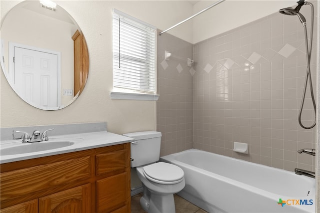 bathroom with bathtub / shower combination, vanity, and toilet